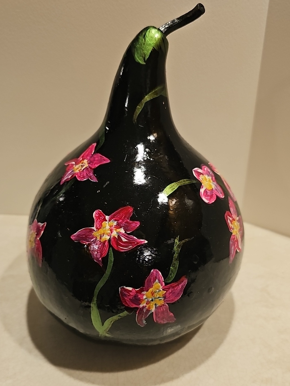Hand-Painted Black Decorative Gourd with Pink Floral Accents